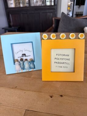 A set of 2 vintage picture frames. Polystone/ Ceramic. For ab 2.8”x2.8” photos.